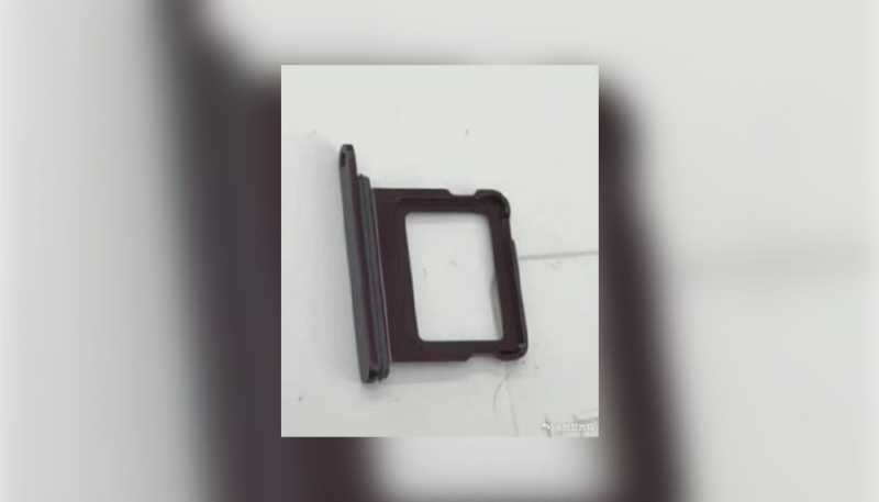 Alleged Image of iPhone 18 Pro Sim Tray Shows Rumored Dark Cherry Color